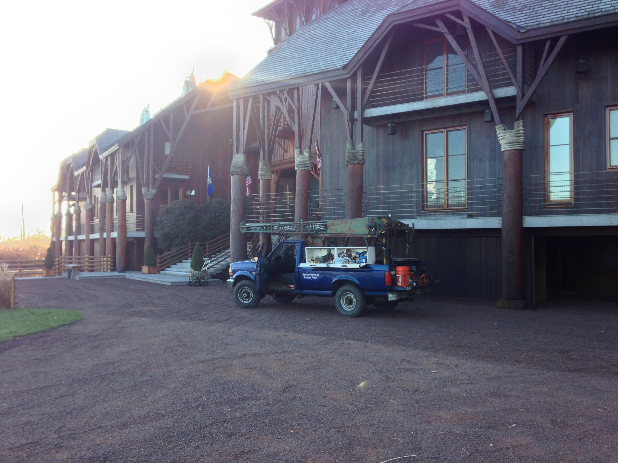 First hoist truck parked at a large hunting lodge in Maryland